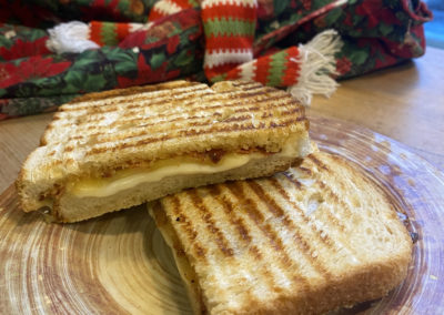 Our most popular sandwich Maple Butter Bacon Grilled Cheese.